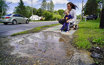 A broken sewer line prompted Caryn Luna to call for a change in her local laws.